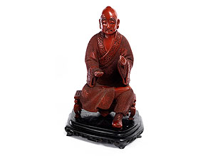 Chinesische Rotlackfigur eines buddhistischen Lehrers